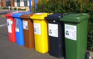 Color coded trash bins