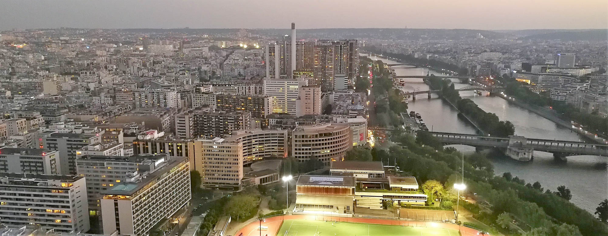 Car battery with green recycle sign.
